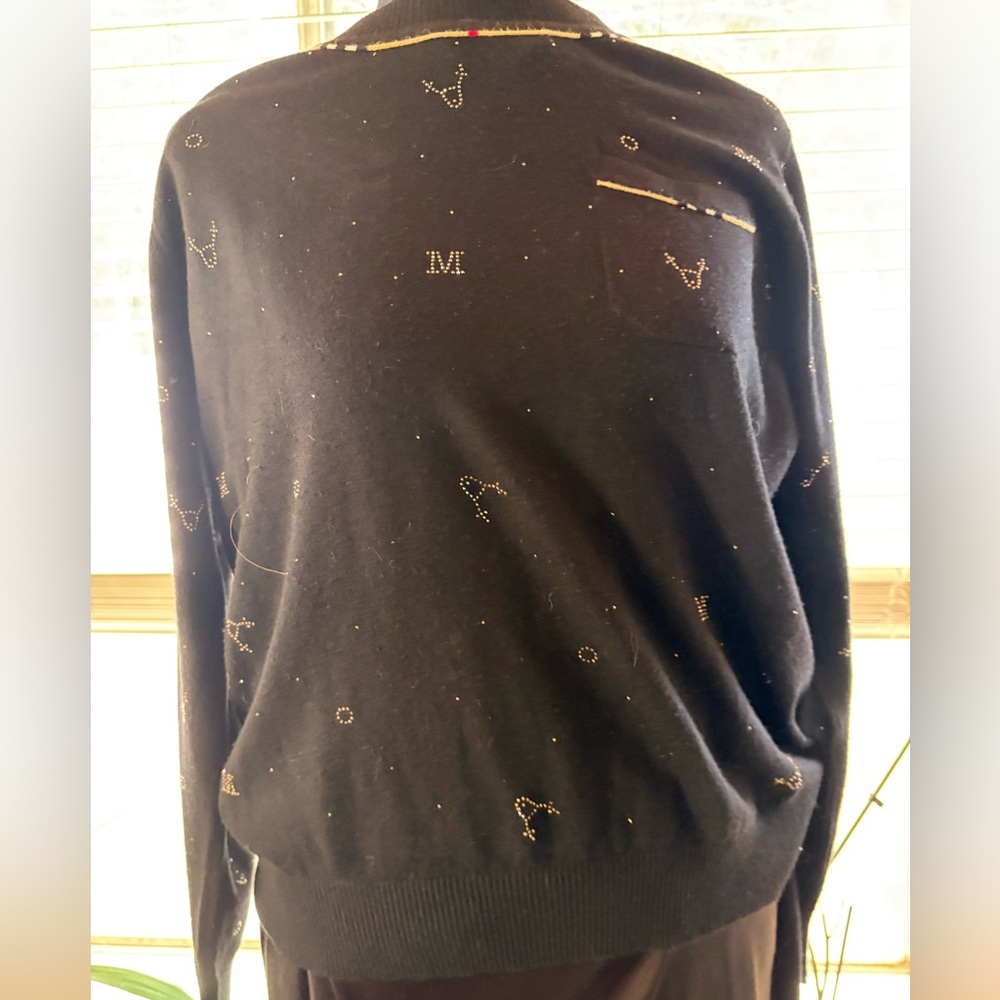 Women’s black sweater with rhinestones